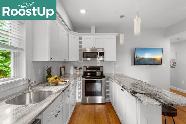 Photo - Furnished Bedroom with Private Bath in East Boston Apartment