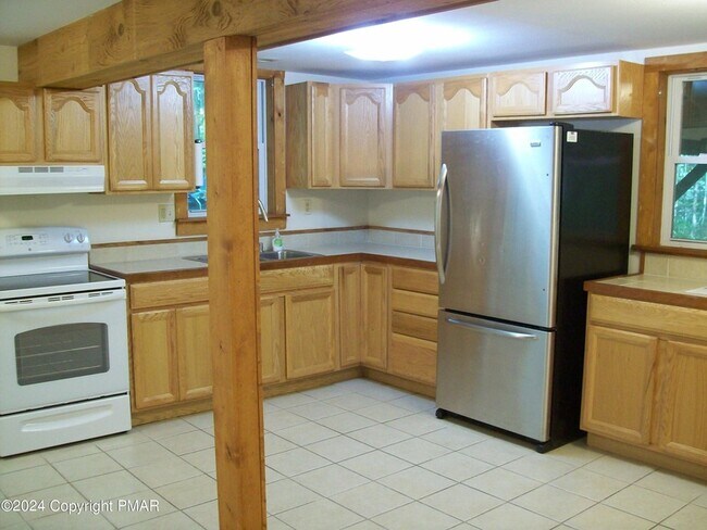 Foto del edificio - 5239 Goldenrod Ave
