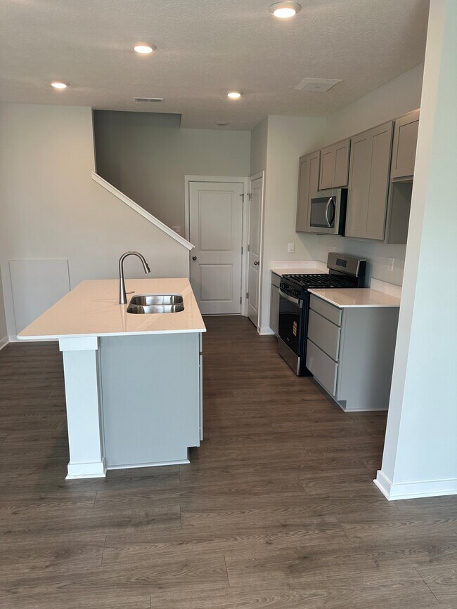 Building Photo - 6306 Marinelli Dr N