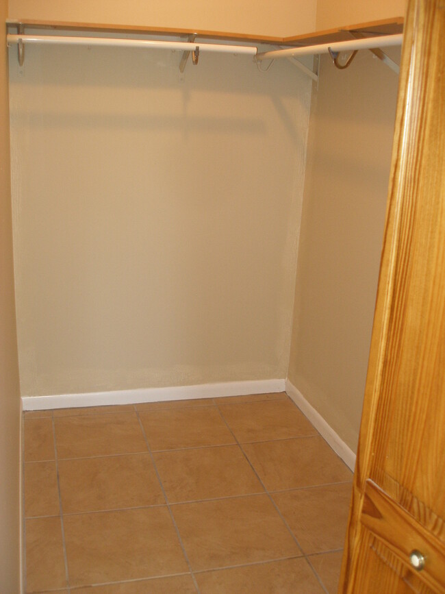 master bedroom walk in closet - 115 Bent Arrow Dr