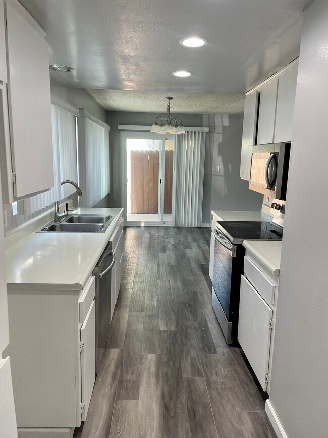 Kitchen, Dining Rm & Patio Entrance - 22622 Maple Ave