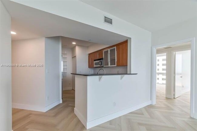 Building Photo - 335 S Biscayne Blvd