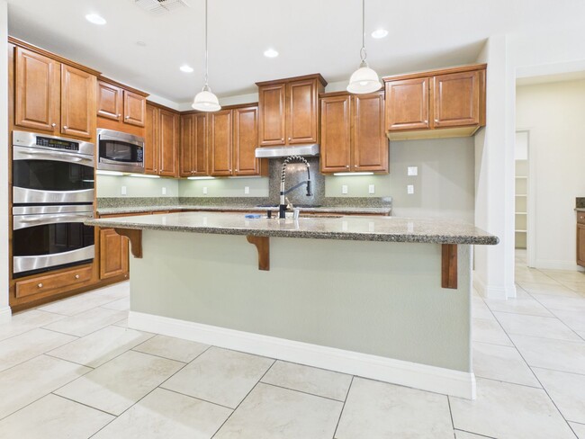 Building Photo - Spacious 5-Bedroom Solar Home in Blackstone with Resort Style Amenities