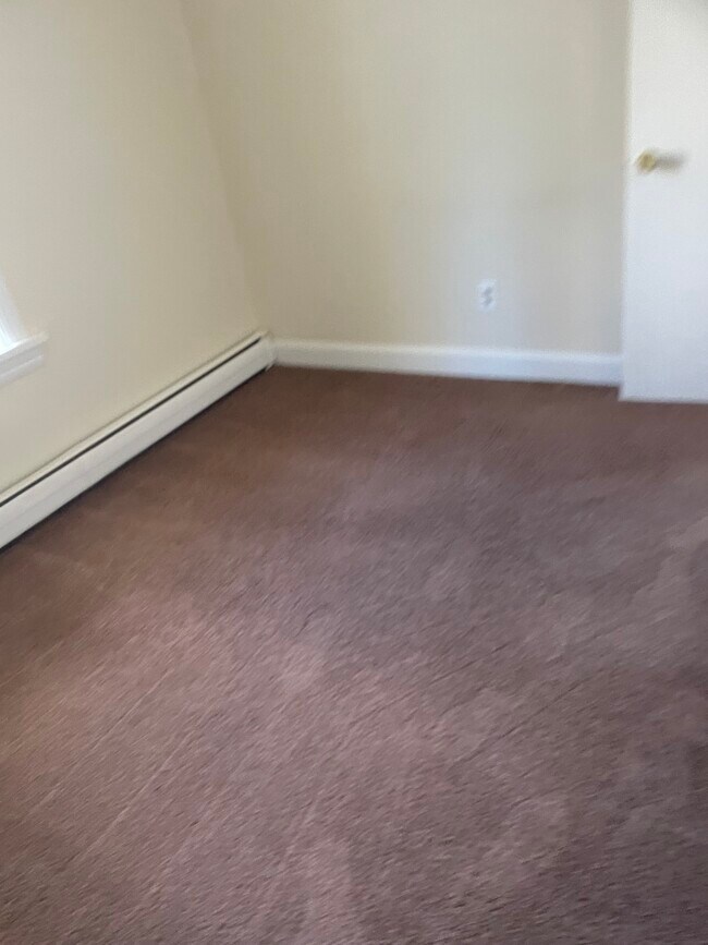 Foto del edificio - 107 E 2nd St