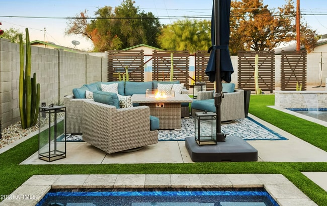 Large concrete pad for patio conversation set (not included) - 928 E Whitton Ave