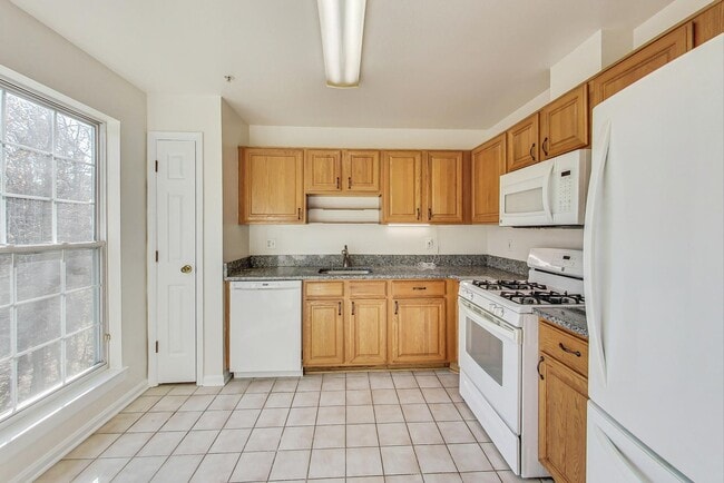 Photo - READY TO GO!!! Renovated 2BD/2BA with 1 Reserved Parking Space & screened in rear porch Apartment