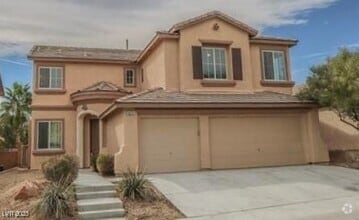 Building Photo - 9029 Blue Raven Ave