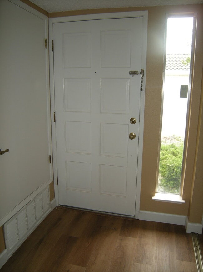 Building Photo - Condo unit featuring updated kitchen with ...