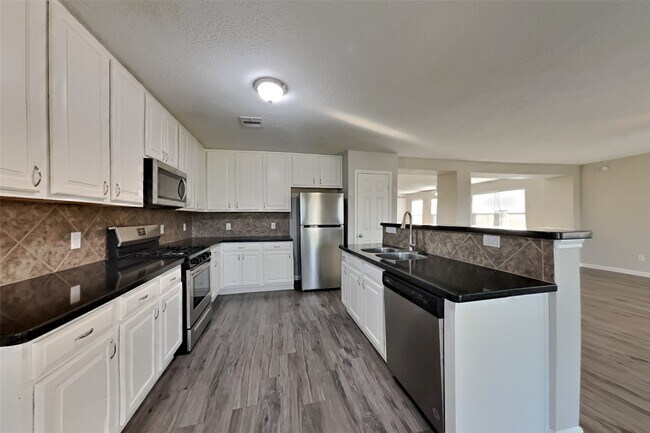 Foto del edificio - 3119 Peachstone Pl