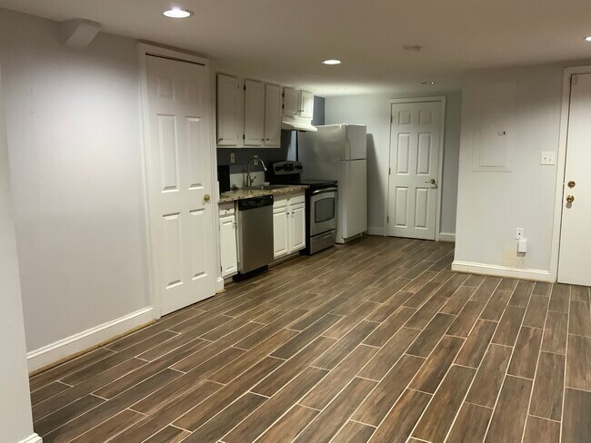 Open living room and kitchen area - 1010 11th St NE