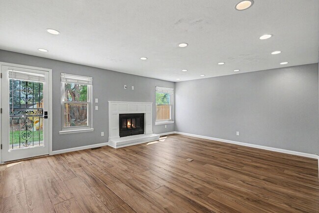 Building Photo - Updated 4BR Corner Lot Home with Finished Basement & 2-Car Garage