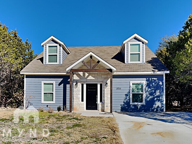 Building Photo - 5711 Barkridge Dr