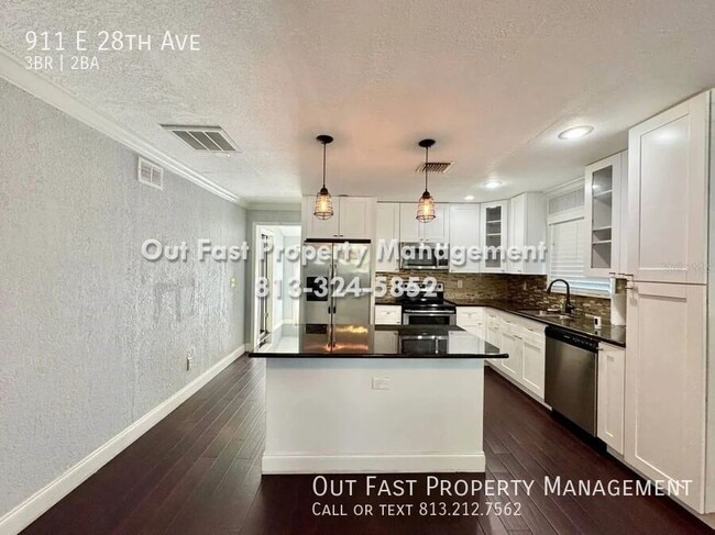 Building Photo - 911 E 28th Ave