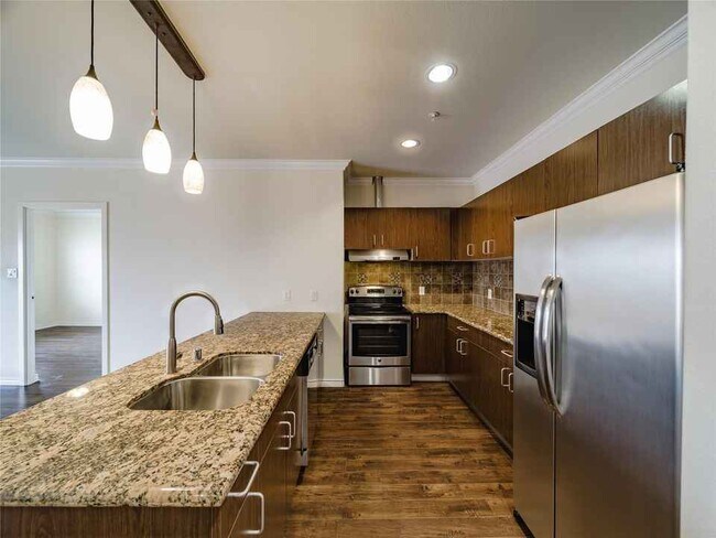 Building Photo - 1100 W Trinity Mills Rd