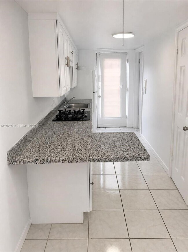 Building Photo - 6498 Collins Ave