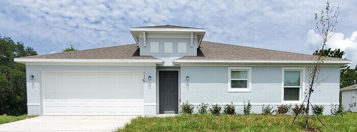 Foto principal - **1ST MONTH RENT FREE! SPACIOUS 3/2 HOME IN PALM BAY