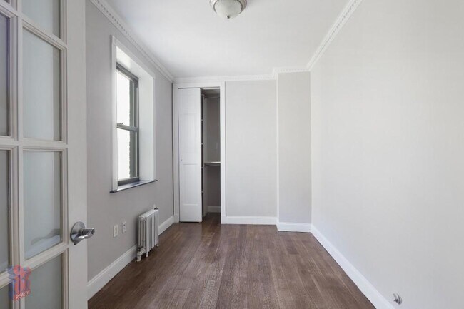 Photo - 326 E 100th St Apartment