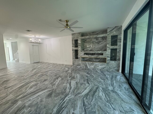 Living/ dining area - 10927 Salt Bay Way Townhome