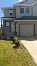 Building Photo - 8207-8208 8 Ave SW