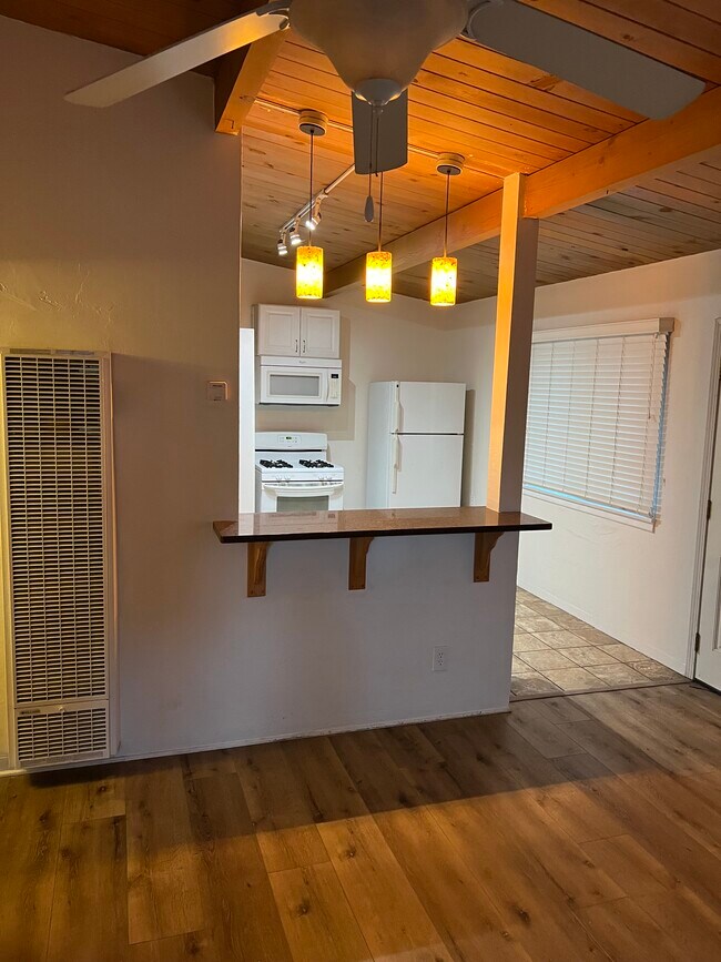 Living room and kitchen bar - 170 Casa St