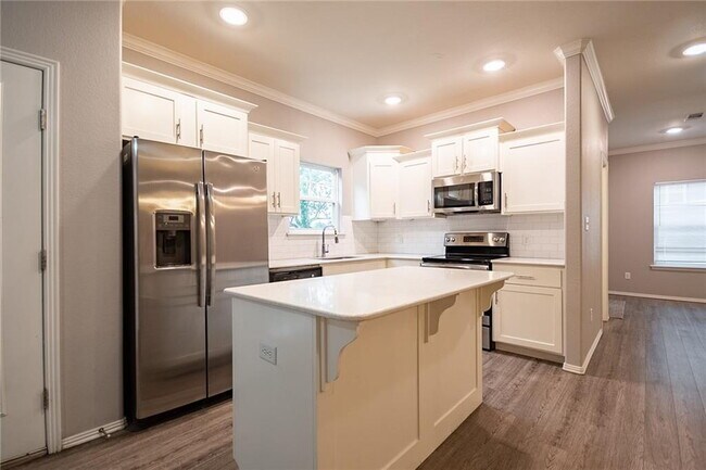 Photo - **MOVE IN SPECIAL $300 off first month rent**Charming 3-Bed and 3 full bath Home