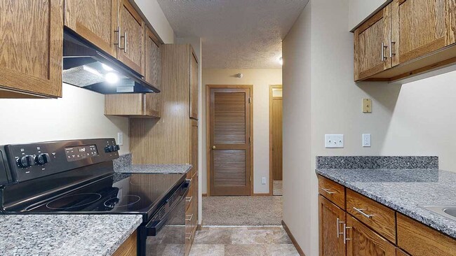 Our renovated homes have beautiful upgraded appliances, counters, and more. - Pine Lake Heights Apartments