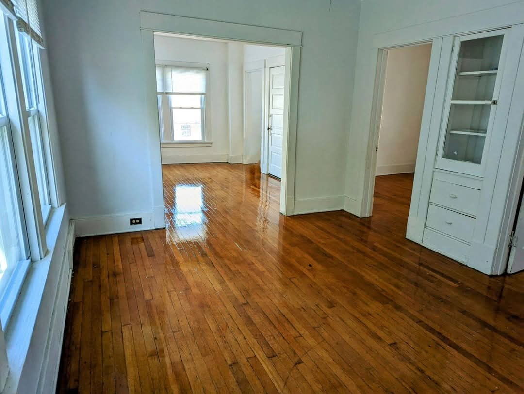 Large Formal Dining Room with Built-in Cabinets, looking into the Living Room - 65 Progressive Ave