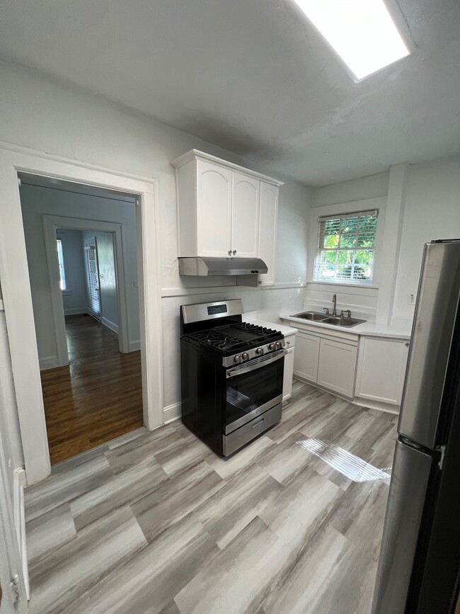 kitchen to dining nook - 1304 N Morningside Dr NE