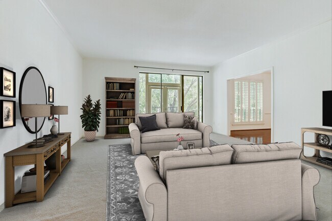 (virtually staged) Large living room with space for various furniture arrangements. - 2400 N Braeswood Blvd
