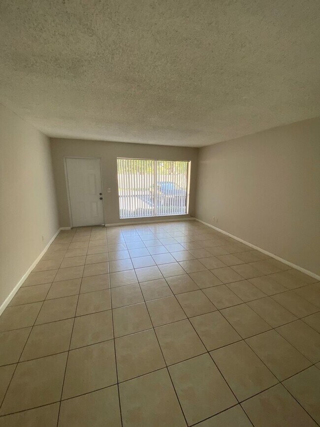 Whispering Palms Apartment Homes 559 NE 48th St Boca Raton, FL