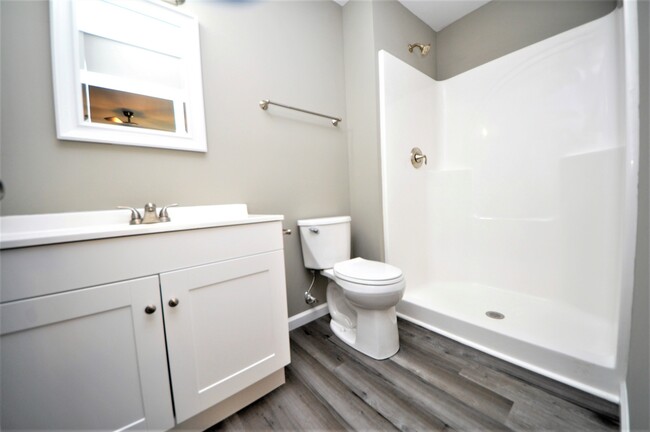 Master bath in townhome - Beautifully Renovated Apartments in Peacef...