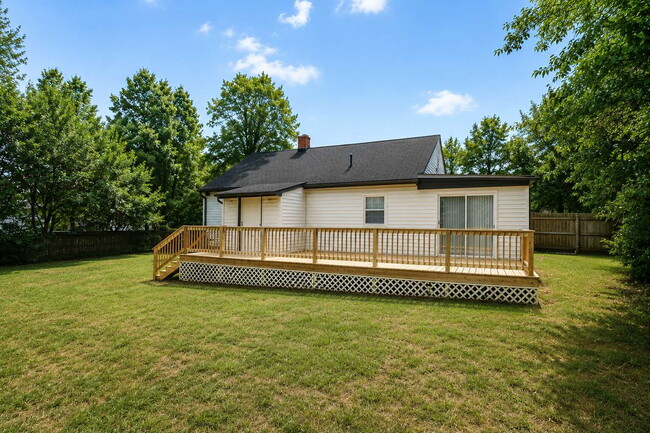 Building Photo - Updated Multi-Bedroom Home | Brand-New Deck | Circular Drive | Triad Premier Realty