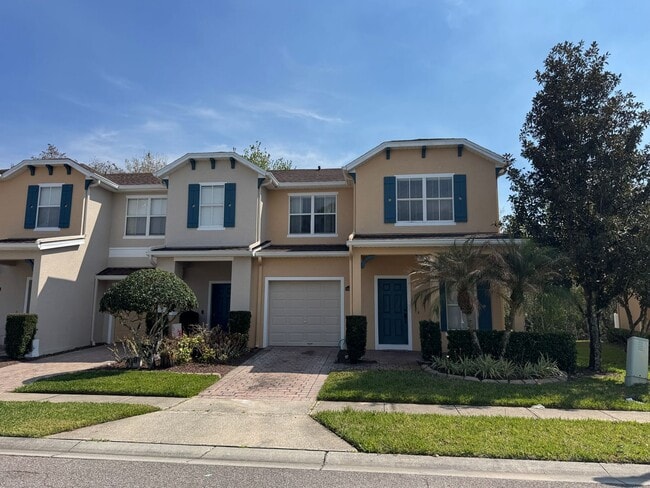 Building Photo - 5 Bedroom Townhome in Avalon Park! TESLA CHARGER INCLUDED!