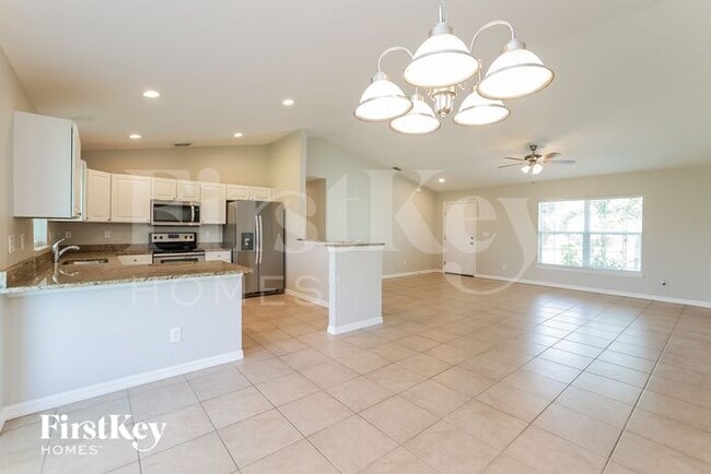 Building Photo - 12177 Helios Ave