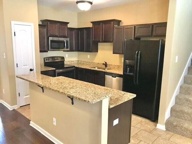 Building Photo - Now Leasing a Spacious 4 Bedroom 2 Bath Ho...