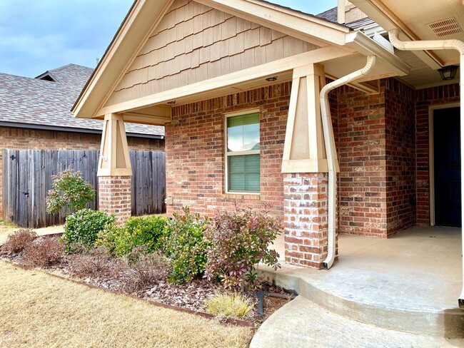 Building Photo - Cute Home In Mustang Schools With Storm Sh...