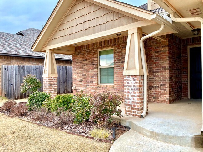 Photo - Cute Home In Mustang Schools With Storm Sh...