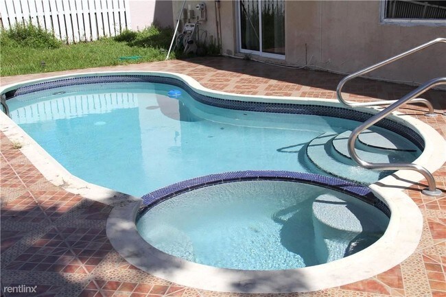 Foto del edificio - 4 br, 2.5 bath House - 897 NW 97th Ave
