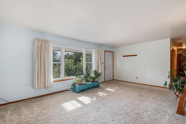 Front Living Room and Main Entrance (drapes are included) - 804 Theo Ave