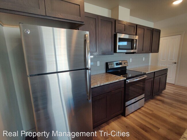 Building Photo - 3 br, 2.5 bath House - 5748 W. Albany Unit...