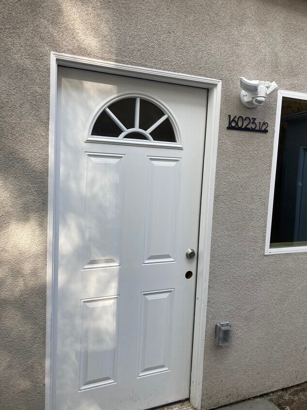 Entry door to new studio apartment - 16021 Victory Blvd