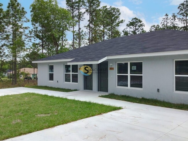 Building Photo - 9454 N Travis Dr