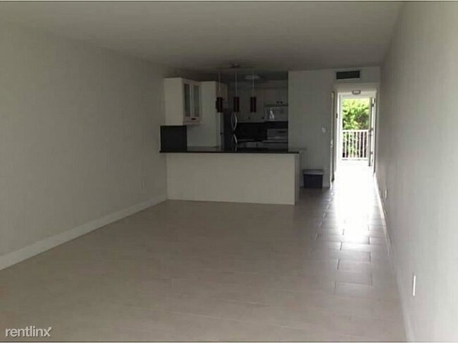 Building Photo - 10220 Collins Ave