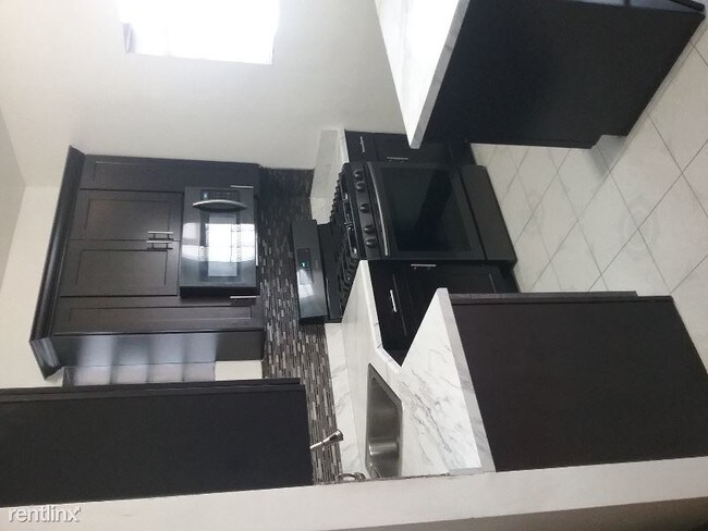 Foto del edificio - 5515 W Quincy St
