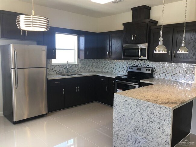 Building Photo - 1705 W Garrison Dr