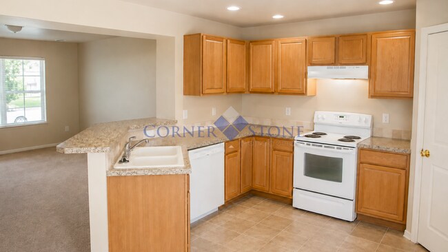 Building Photo - Large 4 Bedroom Home with Garden space, Basketball Court, Close to park!