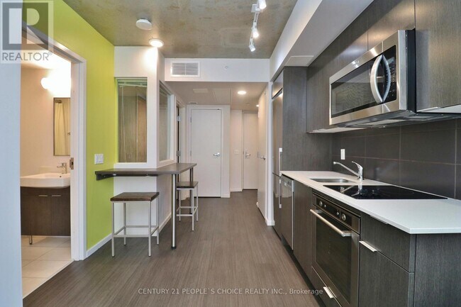 Building Photo - 105-1105 Champagne Ave S