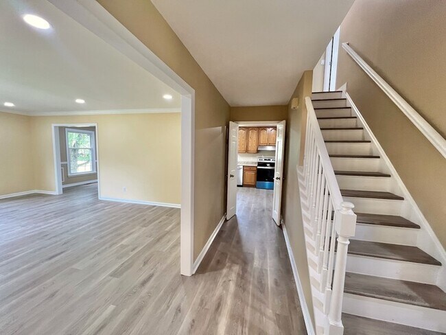 Building Photo - Unique 2 Story with Room for All! Finished...