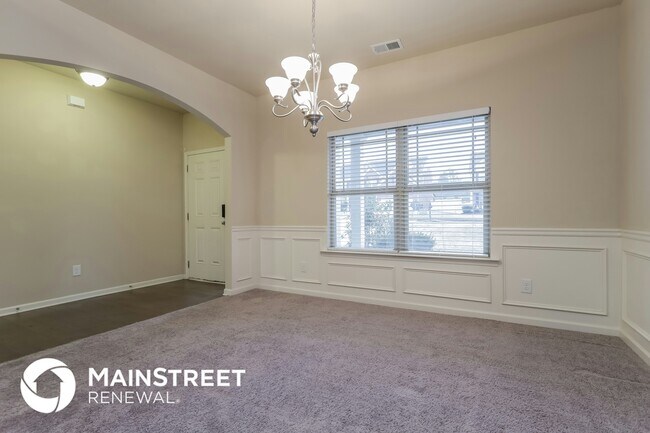 Foto del edificio - 1209 Creek Crossing Dr