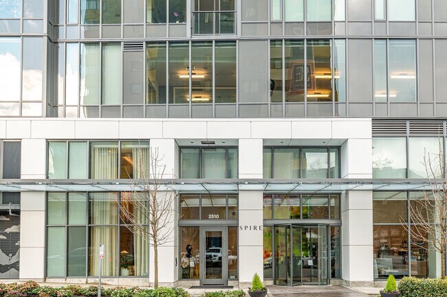 Building Photo - Urban Oasis at Spire Condominiums – Modern...